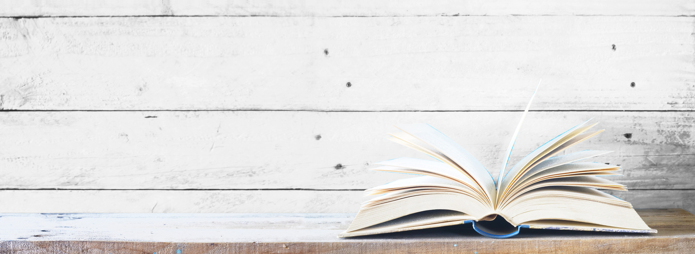Open book on white background